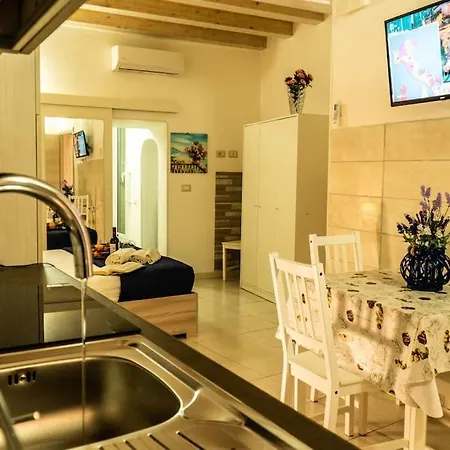 Casa Rosa Ortgia Апартаменты Сиракузы